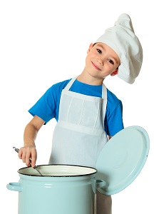 a kid wearing an apron